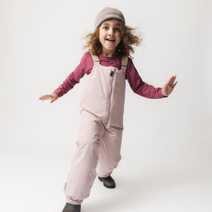 Child wearing MINI A TURE MATWALENTEX snow pants - Adobe Rose